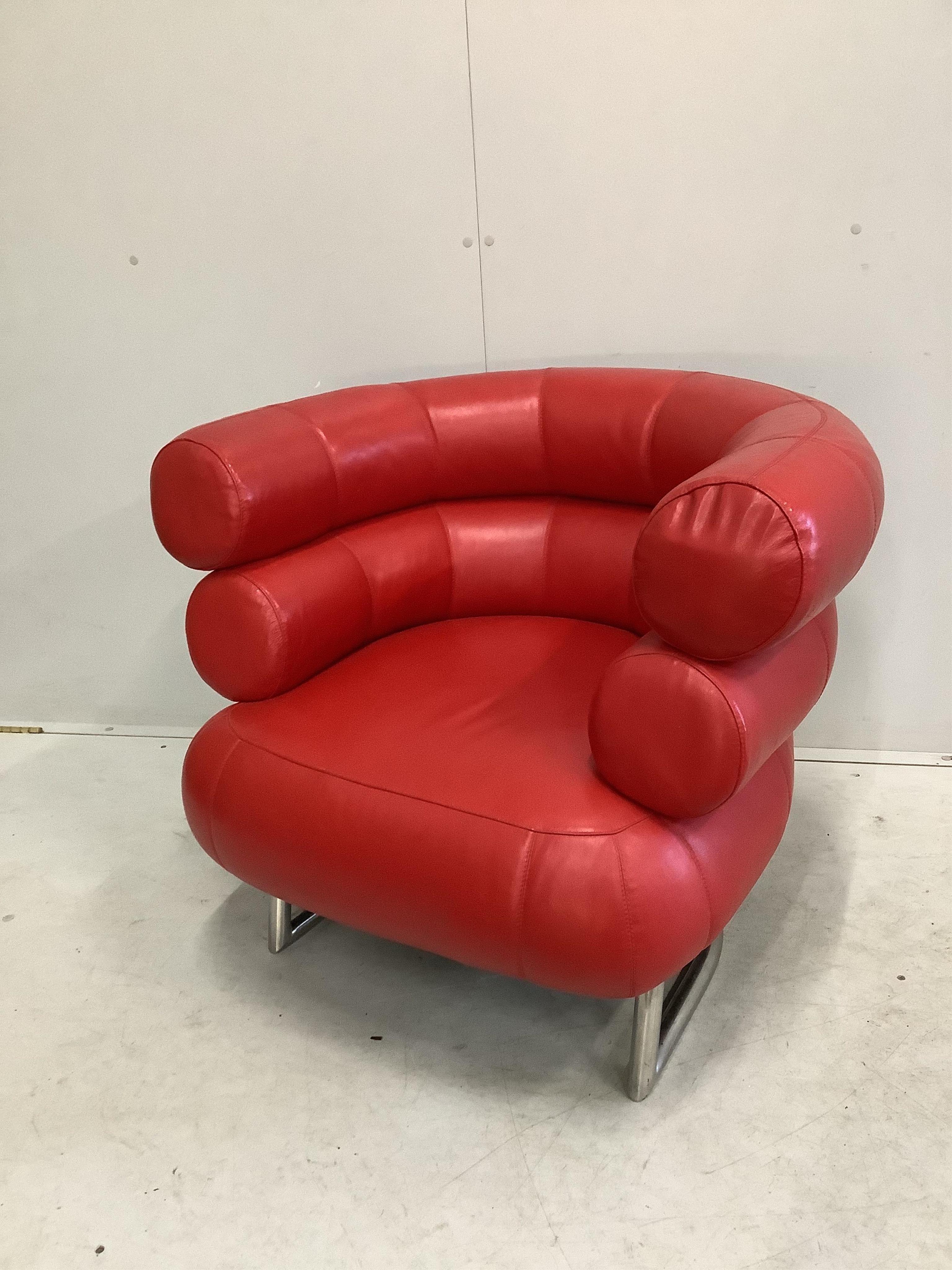 A Contemporary Eileen Gray Bibendum red leather armchair, width 92cm, depth 74cm, height 74cm. Condition - good